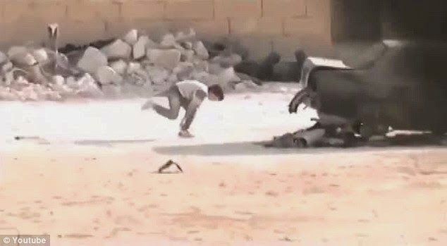 Footage of Syrian 'hero boy' dodging bullets to save girl revealed as FAKE