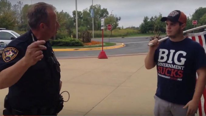 Video of a cop threatening college students with jail for the 'crime' of distributing constitutions