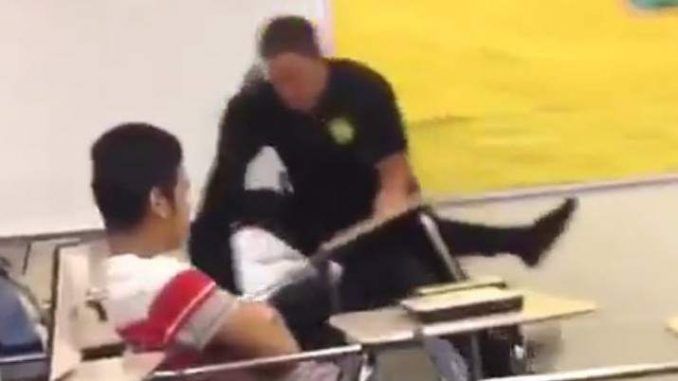 Cop attacks a peaceful female student in classroom