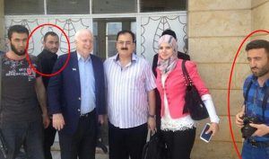 Senator John McCain with ISIS Chief Abu Bakr Al-Baghdadi (circled left) and terrorist Muahmmad Noor (circled right).