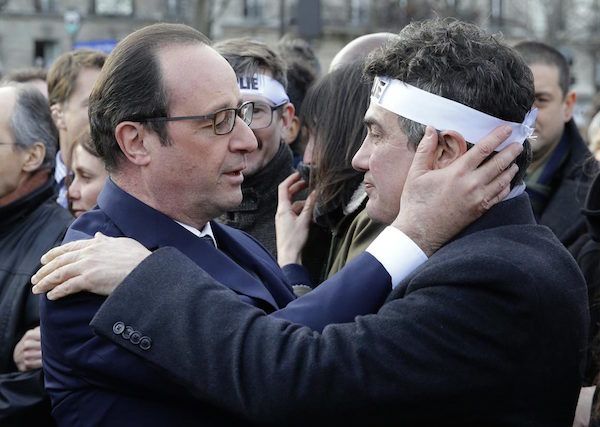 French President Hollande hugging actor/EMT of Paris attacks Patric Pelloux