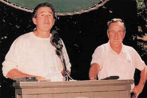 Former President George W. Bush and his father attending Bohemian Grove 