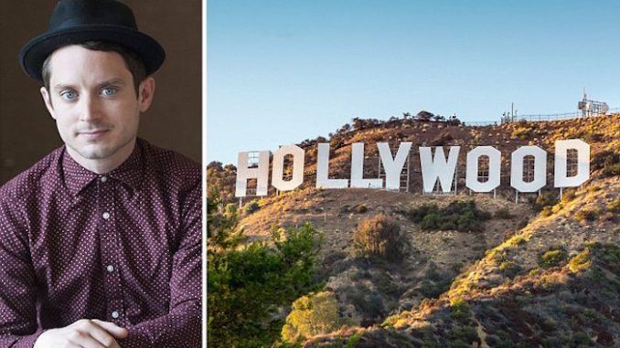 Elijah Wood says the Hollywood paedophile cover-up is much worse than Jimmy Savile