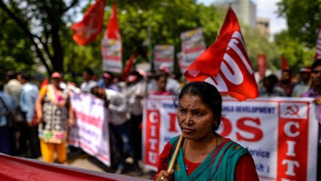 India: Tens Of Millions Strike To Protest Low Wages