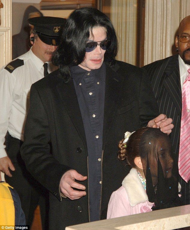 Paris, pictured with her father Michael in 2005 in London, said he would often drop hints that a group "more powerful than the government" were out to get him.