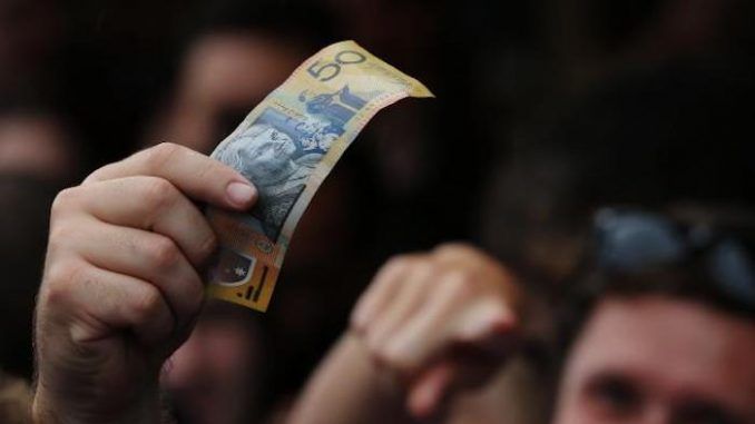 Australia begin microschipping cash