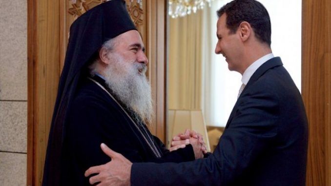 Archbishop declares Assad defender of Christians
