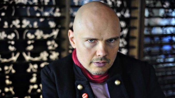 Smashing Pumpkins frontman opened up about his experiences in the record industry, telling Howard Stern that he has seen a "shapeshifting humanoid" in the flesh.
