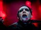 Rock star Marilyn Manson has been hospitalized after a stage prop fell on him, damaging his left leg and crushing both testicles, during a New York show on Saturday.