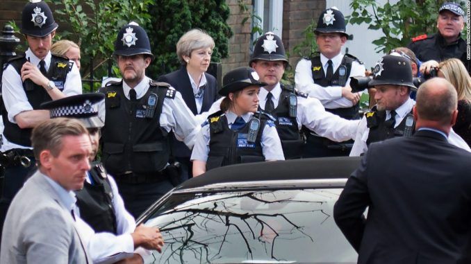 Theresa May's government in collapse after huge porn raid