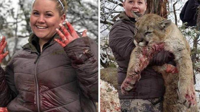 Colorado hunter poses with mountain lion she slayed