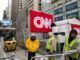 CNN laid off almost an entire division on Tuesday, in a move the struggling network "debunked" as nothing more than a “crazy rumor” just a few weeks ago.
