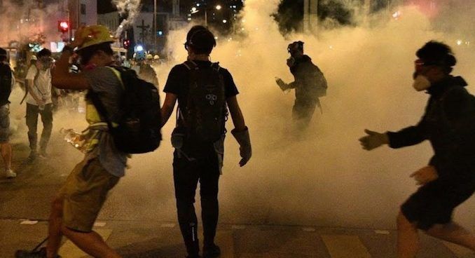 Hong Kong police fire warning shots at protestors