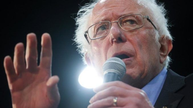 Sen. Bernie Sanders warns the political establishment is trying to derail his campaign and boost Joe Biden's