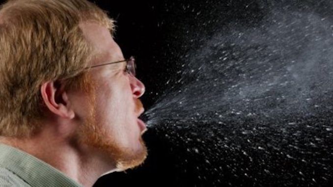 People who deliberately cough in public could face terrorism charges, DOJ warn