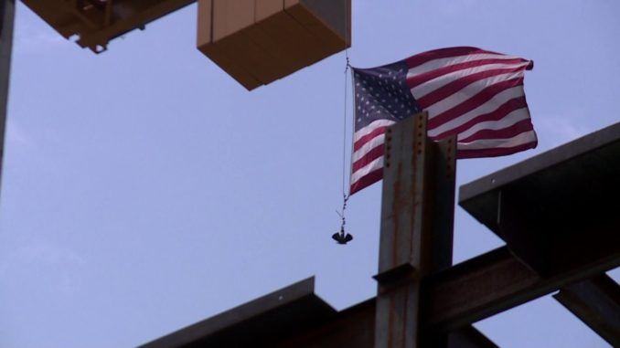 An American flag was removed from a construction site in Richmond, Virginia, on Friday after state officials intervened because they claimed it could become a "target" for protestors.