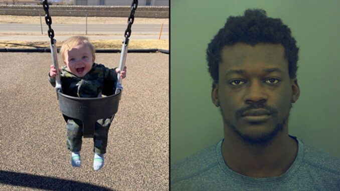 African American man arrested for murdering white baby