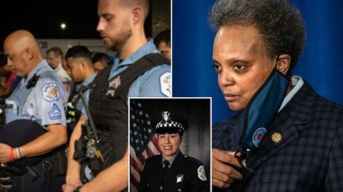 Chicago cops turn their backs on Mayor Lori Lightfoot as two more officers are shot