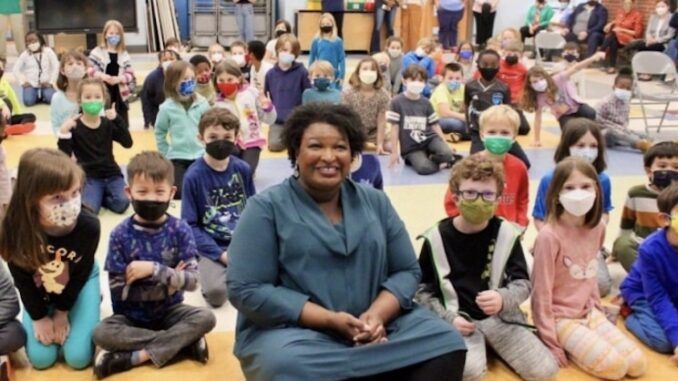 Stacey Abrams deletes photo showing herself unmasked surrounded by masked children