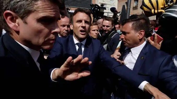 Crowd pelt Rothschild puppet Macron with rotten tomatoes