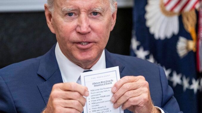 Biden caught holding cue cards written for a dementia patient