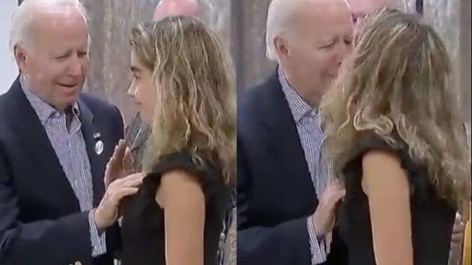 Joe Biden fondle's an underage girls breast in public