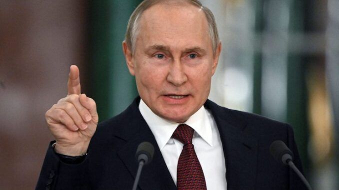 Putin warns US planning false flag chemical attack in Ukraine